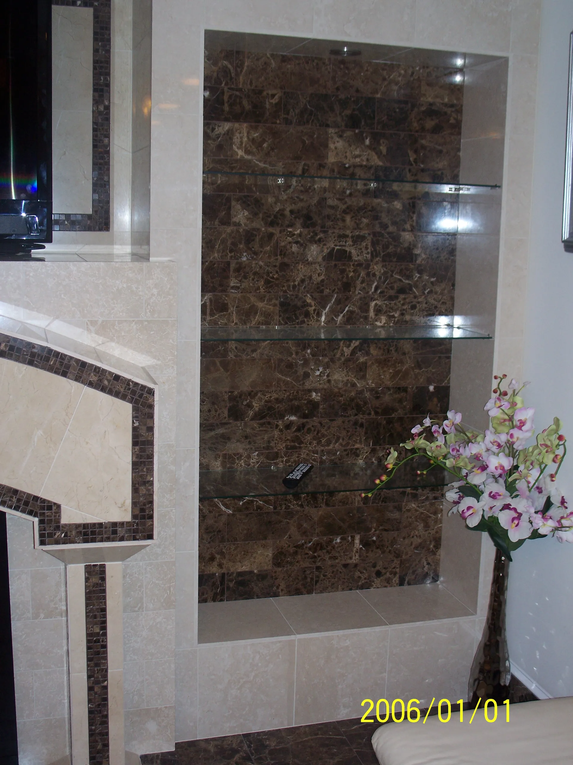 Custom Shelving - Close-up view in living room showing custom tile shelving