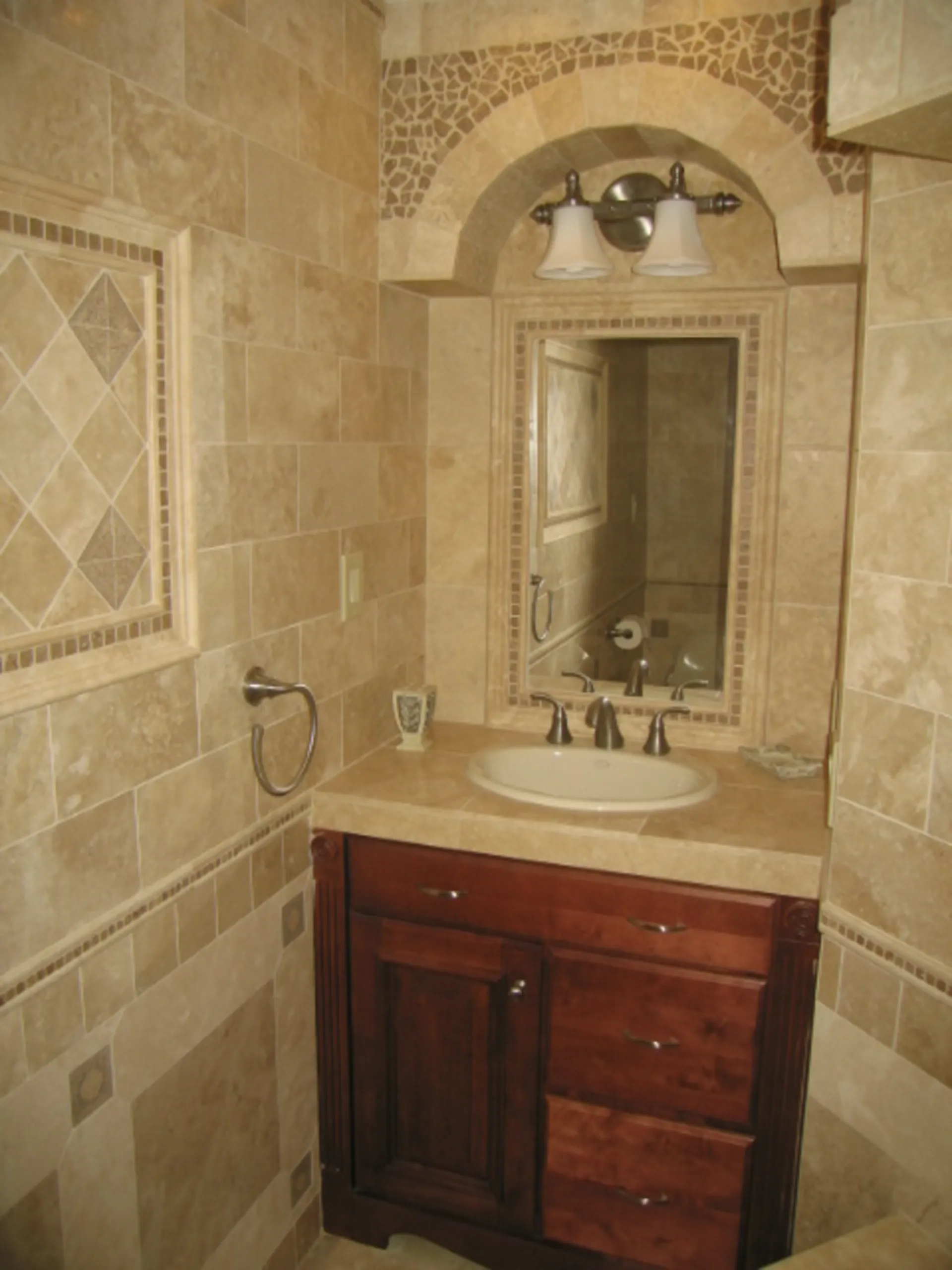 Master Bath - Second vanity view of custom bath with natural stone, dual vanity, custom tile mirror surrounds, and custom tile vanity tops