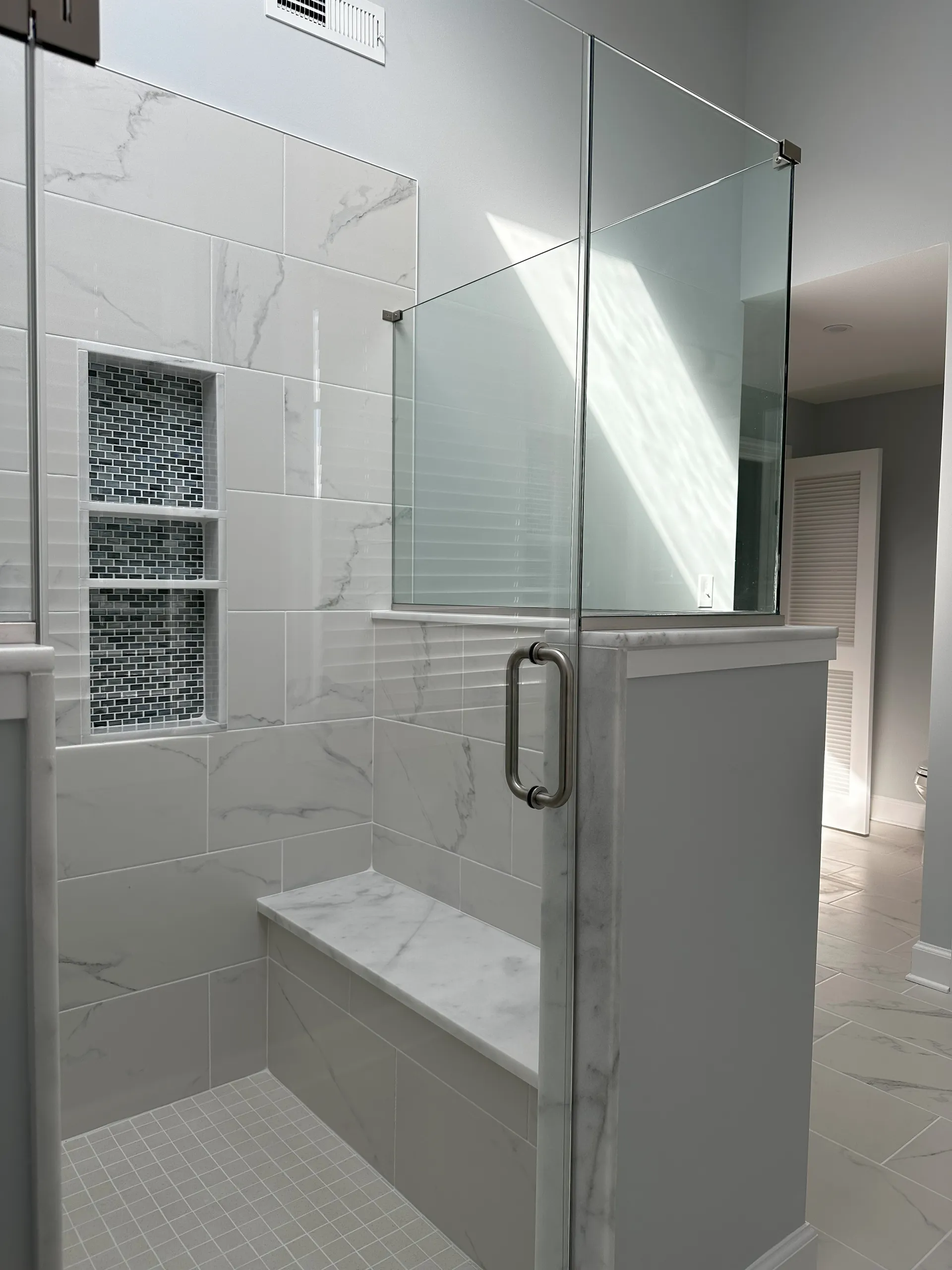 Master Bath - Alternate shower view with custom niche and bench seat